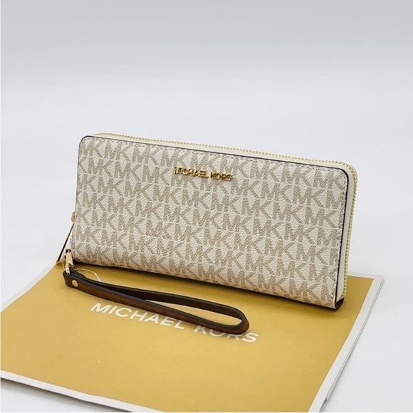 Michael Kors Large Continental Wallet
Wristlet Vanilla/Brown - Picture 9 of 9